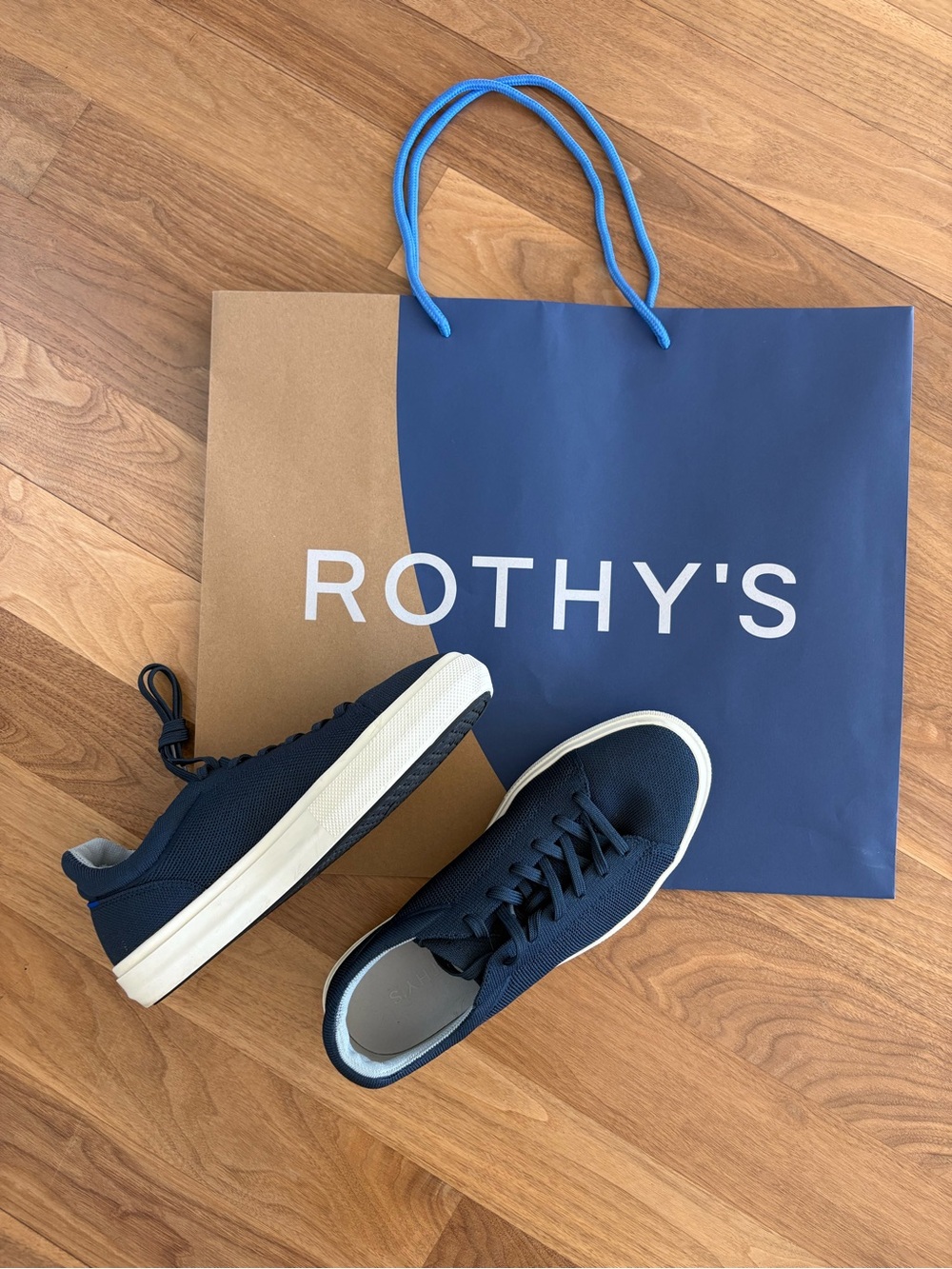 Like New! Rothy’s Navy sneaker unisex men’s 9.5/ women’s 11